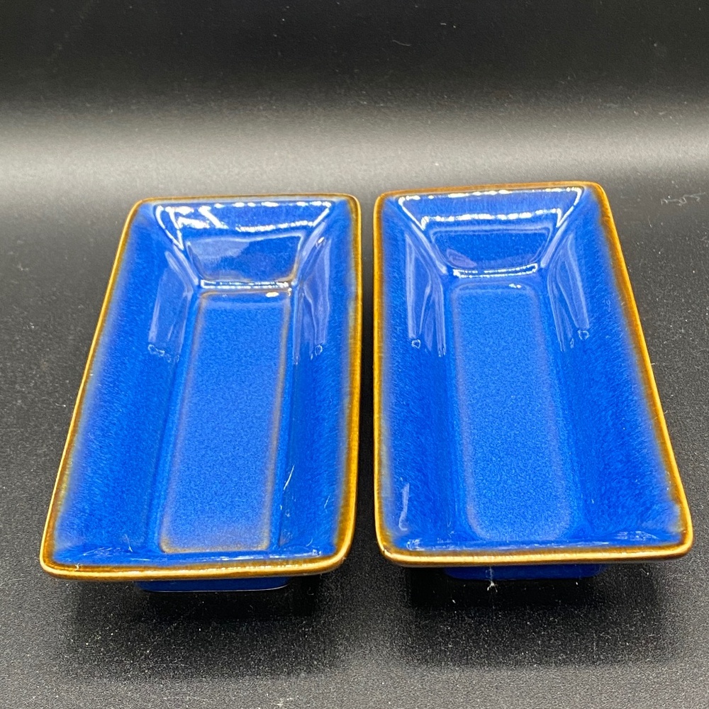 2x side dishes, rectangluar, royal blue with brown rims, porcelain.  No branding